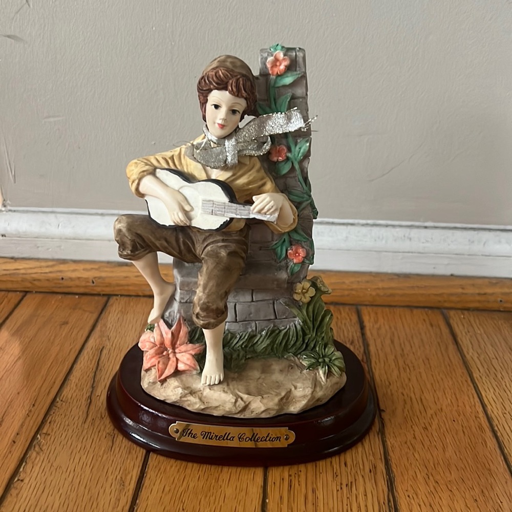 The Mirella Collection Figurine - Boy sitting on wall Playing Guitar